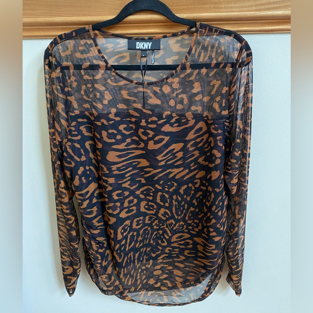 DKNY beautiful leopard design sheer but covered top.